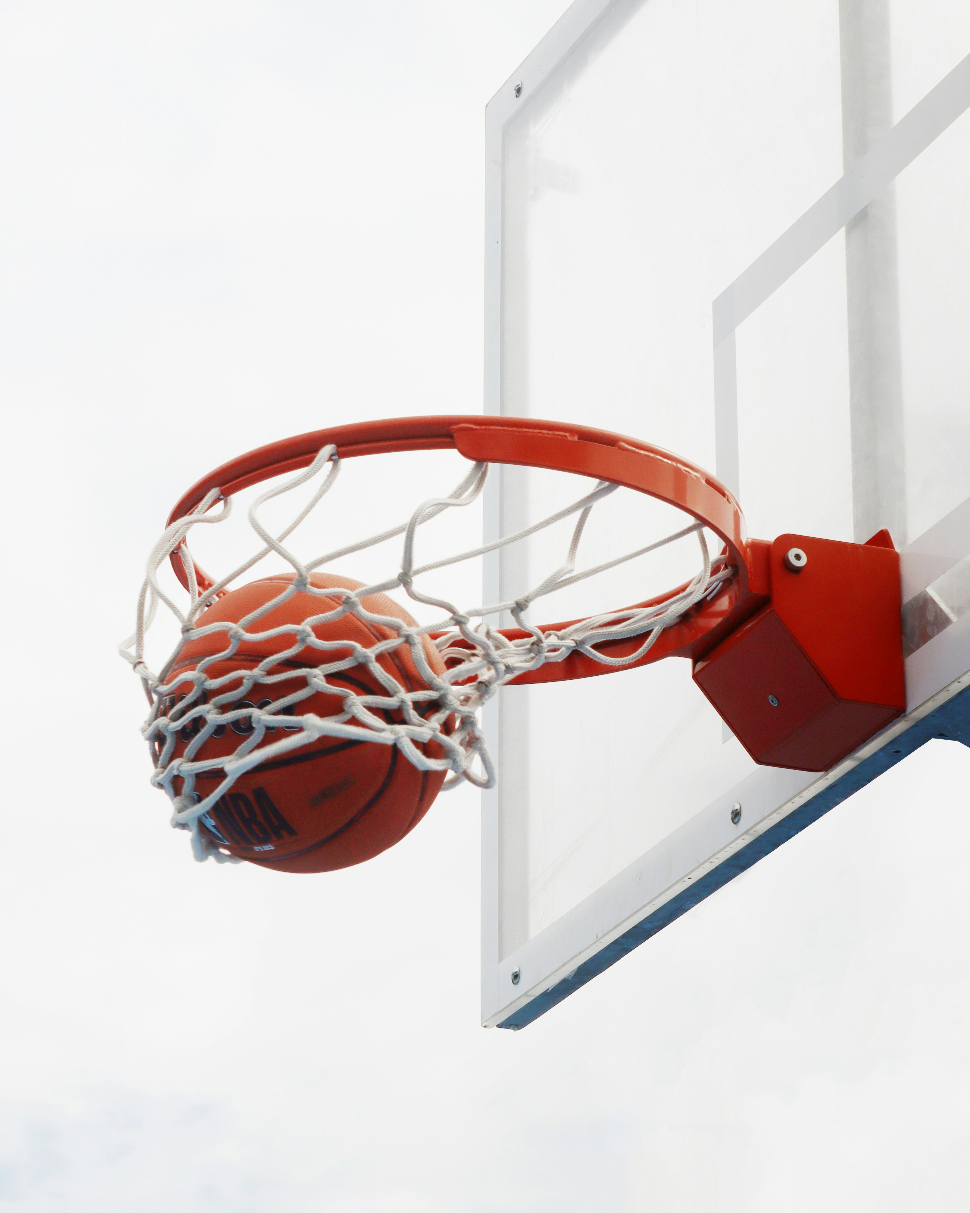Basketball swishing through the net